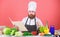 Cooking skill. Book recipes. According to recipe. Man bearded chef cooking food. Check if you have all ingredients. Cook