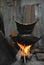 Cooking sticky rice in traditional wood fire,Laos