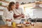 Cooking, tablet and old couple learning baking skills online at home kitchen in a lovely and romantic marriage. Recipe