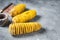 Cooking Tornado or Twist potato fries. Gray background. Top view. Copy space