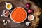 Cooking traditional red lentil Dal. Ingredients for Indian Dhal spicy curry.