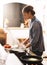 cooking up something healthy. a young woman preparing a healthy meal at home.