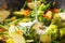 Cooking a vegetarian meal in a wok, cream splashing on vegetables