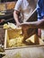 Cooks making dough for Tortillas on a kneading trough