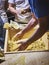 Cooks making dough for Tortillas on a kneading trough