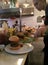 Cooks preparing burgers in a restaurant kitchen