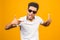 Cool afro american man wearing sunglasses over isolated background, having successful idea. Exited and happy. Number one