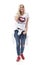 Cool attractive blonde hair middle age woman in jeans smiling, walking and talking on the cellphone