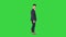 Cool attractive businessman does different defiant gestures on a green screen, chroma key.