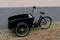 Cool black retro electric bicycle with large cargo hold in front