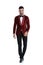 Cool fashion man in red velvet tuxedo walking