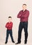 Cool guys. Father little son red shirts family look outfit. Best friends forever. Happiness being father of boy. Dad and