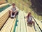 Cool hipster couple resting on the bench, youth, teenagers