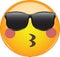 Cool kissing emoji in sunglasses! Awesome blushing yellow face emoticon wearing sunglasses, blushing and kissing lips. Expression