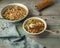 Cool light soup on kvass with fresh vegetables on a wooden tray, denim napkin and wooden pepper shaker-mill. Serving on a wooden