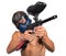 Cool paintball player with marker on white background