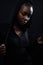 Cool and pensive woman with dark skin and attitude wearing hoodie