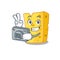 Cool Photographer emmental cheese character with a camera