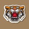 Cool roaring Tiger sticker. Vector illustration of Angry head.