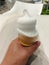 Cool soft white Ice cream cone in left hand. man body hold sweet dessert for relaxing and refreshing. homemade creamy.