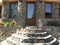 Cool stone house entrance with mirror glasses
