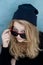 Cool teenager wtih wool hat and sunglasses