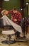 Cool and trendy. Hairstylist in barbershop. man in hair salon with hipster haircut. beard and mustaches. Professional