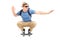 Cool young man riding a small skateboard
