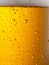 Cooled glass of beer close-up.  Small water drops on cold surface of beer glass