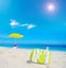 Cooler bag on the sand in a tropical beach