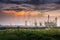 Cooling Tower of Oil and Gas Refinery Plant at Sunset. Process Buildings of Petrochemical Manufacturing., Business Engineering and