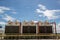 Cooling towers in data center building. Air conditioning cooling towers in front of building with fins to the front. Industrial co