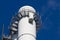 Cooling towers of nuclear power plant against the blue sky