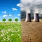 Cooling towers of a nuclear power plant in a devastated landscape and wind turbines on a meadow.