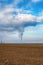 Cooling towers of nuclear power plant NPP Jaslovske Bohunice EBO in Slovakia. Clouds of thick smoke from chimneys on blue sky