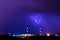 The cooling towers of thermal power station in the rainy night with the lightning