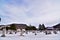 Coon valley cemetery in Winter with the 1876 evangelical Norwegian Lutheran church and drifters area bluffs covered in snow.