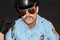 Cop with mustache, sunglasses and hat