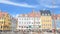 Copenhagen, Denmark - August 25, 2014 - Scenic summer view of Nyhavn pier canel with color buildings, ships, yachts