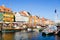 Copenhagen, Denmark - July 7, 2018. Streets of Copenhagen. Beautiful colorful houses on the canal. Nyhaven. City landscape. Archit