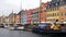 COPENHAGEN, DENMARK - MAY 31, 2017: Nyhavn a 17th century harbour in Copenhagen with typical colorful houses and water canals