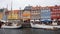 COPENHAGEN, DENMARK - MAY 31, 2017: Nyhavn a 17th century harbour in Copenhagen with typical colorful houses and water canals