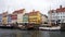 COPENHAGEN, DENMARK - MAY 31, 2017: Nyhavn a 17th century harbour in Copenhagen with typical colorful houses and water canals