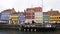 COPENHAGEN, DENMARK - MAY 31, 2017: Nyhavn a 17th century harbour in Copenhagen with typical colorful houses and water canals