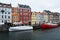 COPENHAGEN, DENMARK - MAY 31, 2017: people in open cafes of the famous Nyhavn promenade.