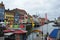 COPENHAGEN, DENMARK - MAY 31, 2017: tourists in open cafes of famous Nyhavn promenade. Nyhavn a 17th century harbour in Copenhagen