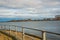 COPENHAGEN, DENMARK: White windmills on the horizon on the waterfront. Beautiful panoramic view from the waterfront