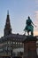 Copenhagen, tower of the baroque Christiansborg Palace and Statue of Absalon