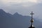 Copper cross against Lienzer Dolomites
