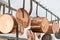 Copper kitchenware pots, pans, jugs hang from the ceiling in the kitchen